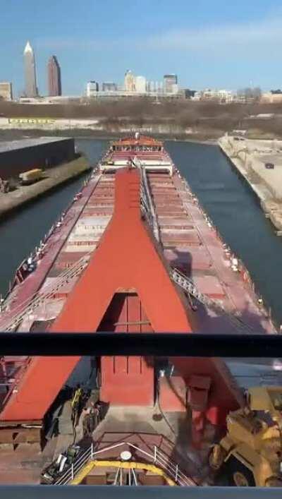 My hat off to the guys that do this for a living. Freighter outbound on the Cayahoga river towards Lake Erie in Cleveland Ohio.