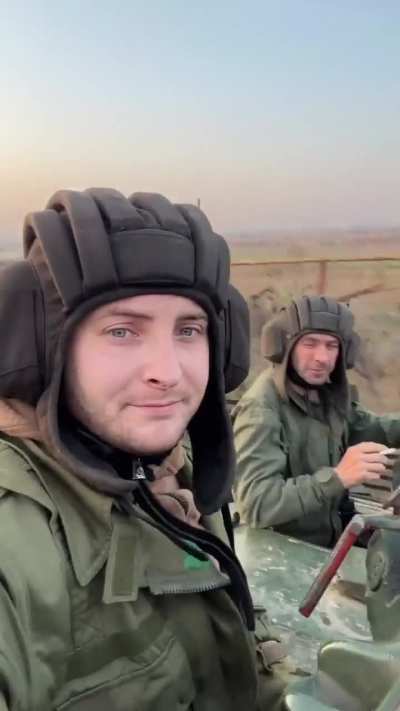 Ukrainian tank commander takes a selfie looking out the hatch of the driving tank. Siversk region, September 2024. Happy Tank Troops Day!