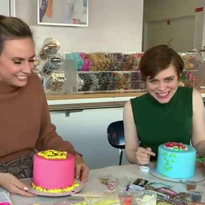 Sophia decorating a cake