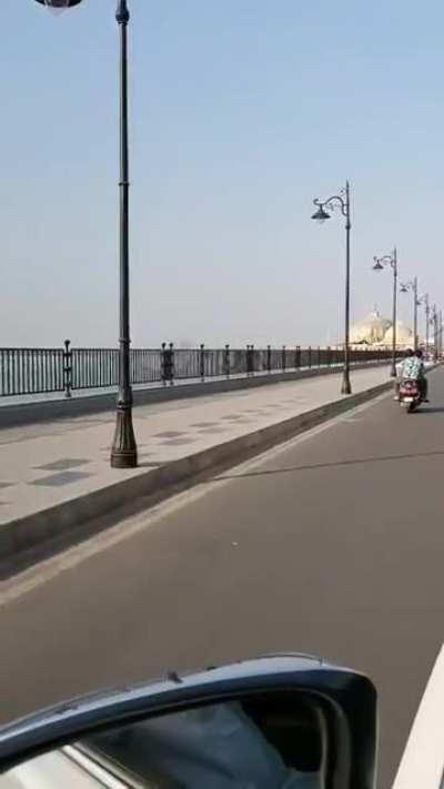 View of Tankbund after it's renovation: The concrete slabs have been replaced with new granite on the footpaths. Specially designed cast iron railing, grills and aligned designer lamp posts have been set up to the area.