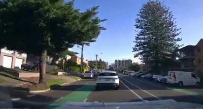 Give way to cars already in a roundabout. How has he cut him off? You give way to what’s in the roundbout not some flog half a km off. Dash cam driver need to relearn roundabout rules