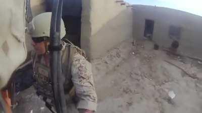 US marine takes a headshot from a Taliban sniper in Helmand Province, Afghanistan