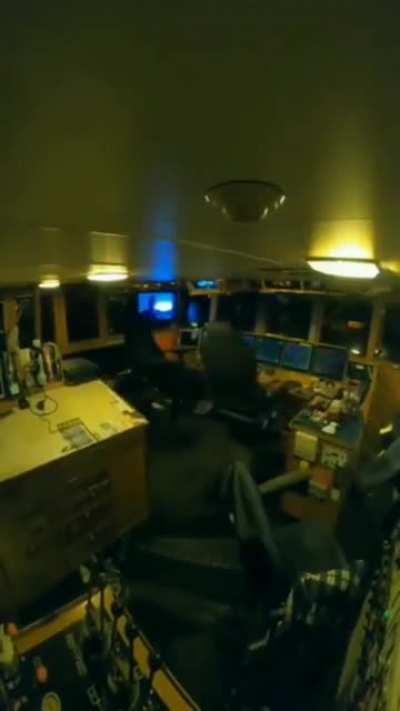 The struggle of crew member inside a ship when waves hit it in the middle of the ocean.