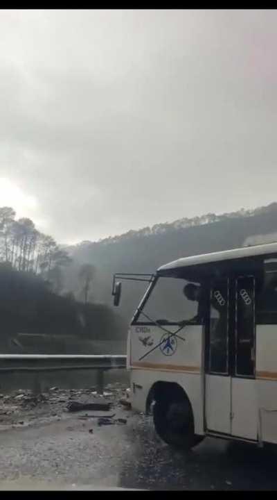 Bus Driver flies out the passenger window due to collision.