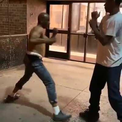 young man throws hands with old head