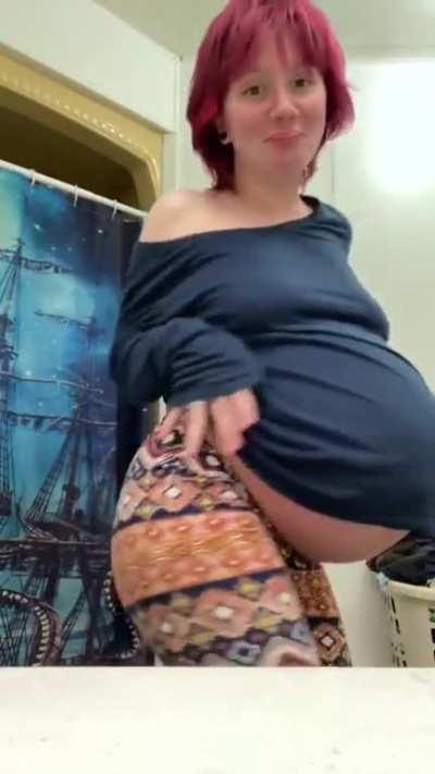 Big belly hanging through shirt