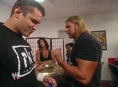 Randy Orton and Triple H retrieve their numbers for Royal Rumble 2006.