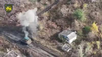 A Ukrainian T-64BV tank withstands a hit from a Russian Lancet in the Lyman direction - October 2024