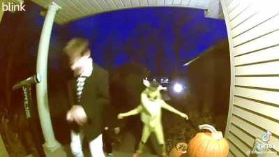 Trick or Treaters surprise unsuspecting woman