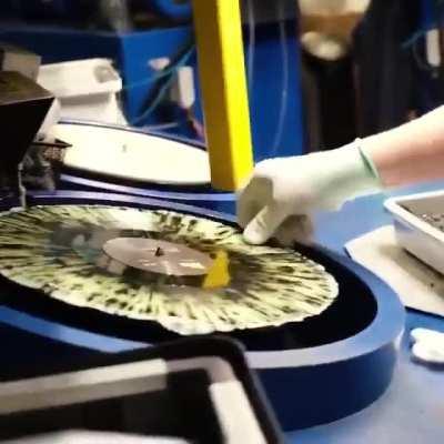 The process of making a vinyl record.