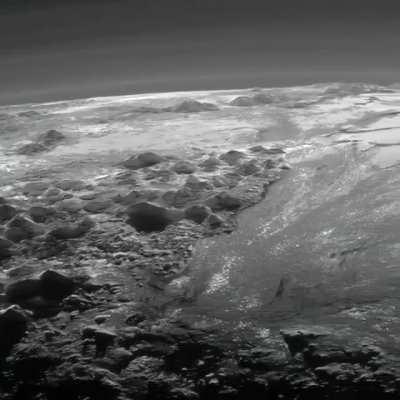 🔥 Pluto’s ice mountains, frozen plains and layers of atmospheric haze as seen by the New Horizons spacecraft.