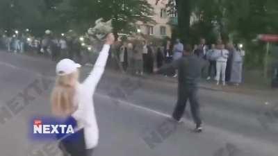 Belarus, a riot police soldier gets rid of his uniform in support of people protesting current regime