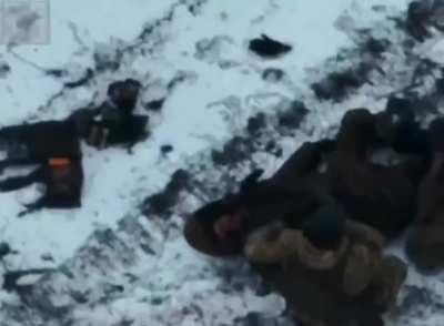 Moments after a Ukrainian FPV kamikaze drone hit a Russian IFV with infantry on top, Russians evacuate survivors.