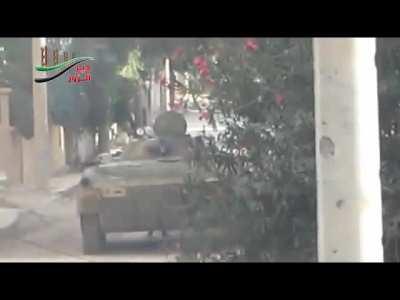 Al-Mustafa Battalion fighters ambush an SAA BMP-1 with an RPG & small arms fire - Deir ez-Zor - 10/31/2012