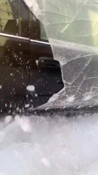 Clearing the ice from a car