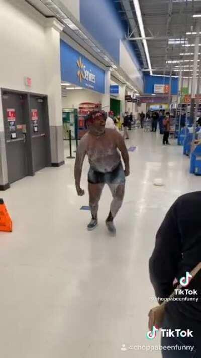 Dude Dumps milk all over walmart register in front of a kid, thinks he’s funny