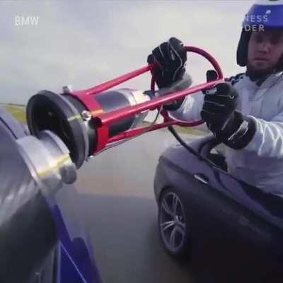 Watch BMW refuel a car mid-drift and claim two world records