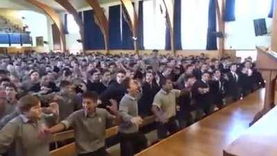 Entire boys school honors retiring teacher with Haka