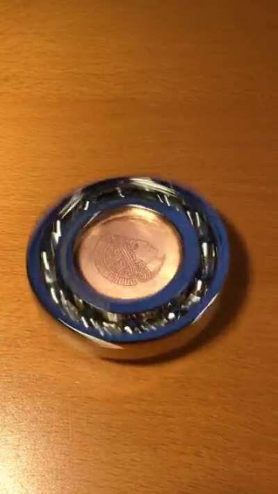 The sound this medal makes just before stopping to spin