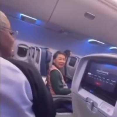 This lady on a plane. 