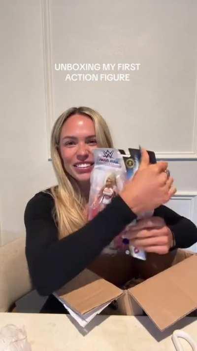 Maxxine Dupri unboxes her first action figure