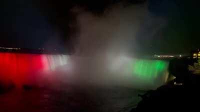 Niagara Falls illuminated colors of Iranian flag, for 22 minutes in memory of Mahsa Amini. She was murdered at age of 22.