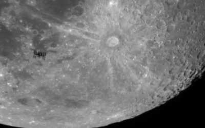 I captured the International Space Station flying in front of the moon. This is a video of the transit slowed down 7x, it was only in the frame of my camera for 1/25th of a second.