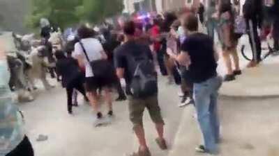 Mounted police officer tramples protester in downtown Houston