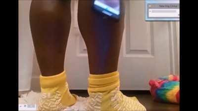 Dominant ebony girl with thick powerful calves wants to crush a head in her legs.