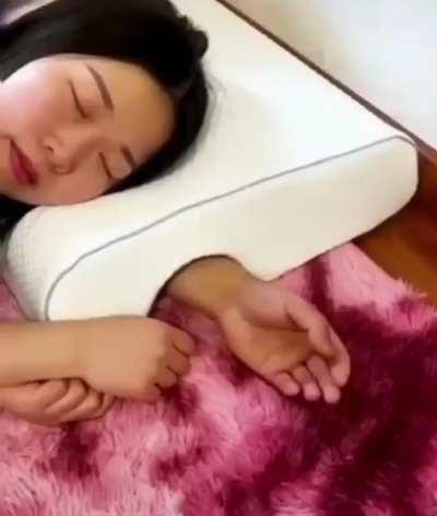 This new pillow has a hole for your arm