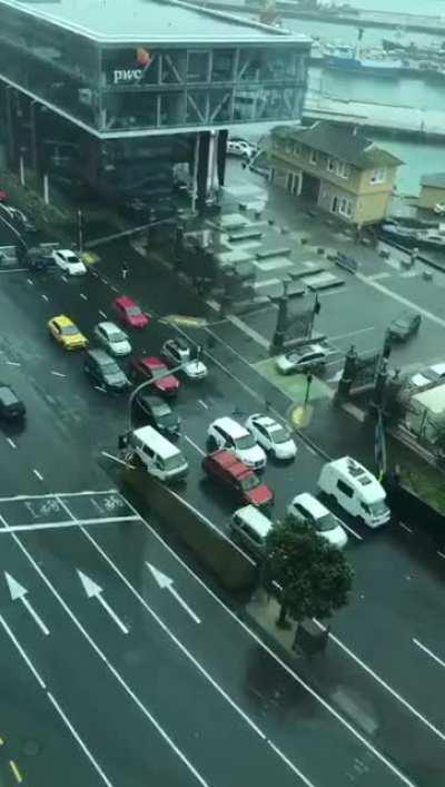 Gridlock protestor gets out of his car and pushes a pedestrian