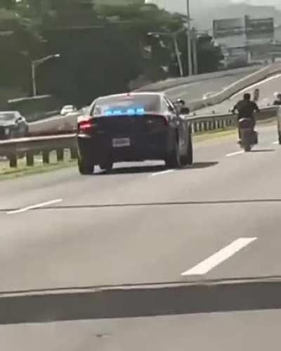 Idiot falls from motorcycle after running from police for not having a helmet, license plate, or registration.