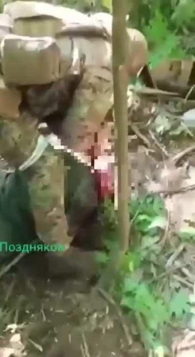 Old footage. 21+ Russian militants cut off the head of a Ukrainian prisoner of war