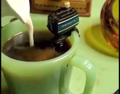 A coffee stirring mini boat engine