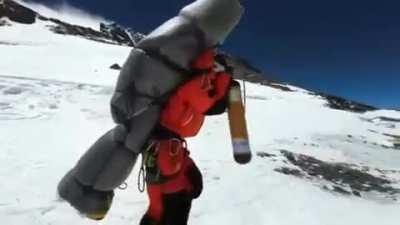 Mt. Everest guide Gelji Sherpa rescues Malaysian climber stranded at 27657 ft. (8430 m.)