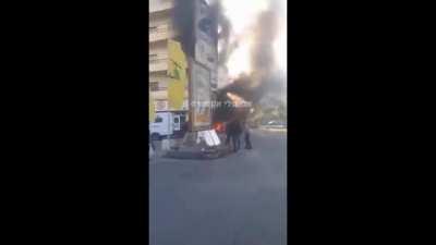 Israel drone strike against Hezbollah commander in Nebatiyeh, Lebanon, note the hezbollah flag with the wreckage in the background