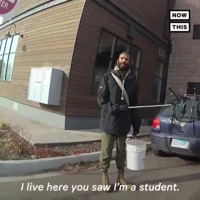 Cop pulling out his gun on a student outside his dorm