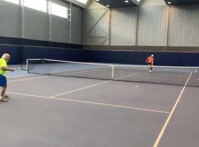 Federer and nadal training before the 2022 laver cup, Federer is wearing Ukraine colours in support