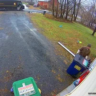 UPS delivery man goes the extra level to hide the package.