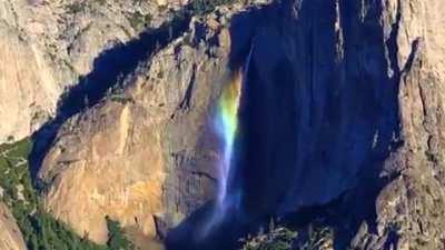 High winds at the perfect time of day created a previously undocumented 2,400-foot rainbow waterfall in Yosemite National Park