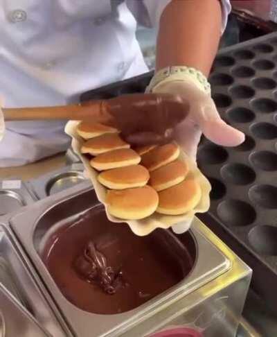 This tray of fresh, hot aebleskivers.