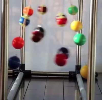 Homemade pendulum with 15 billiard balls