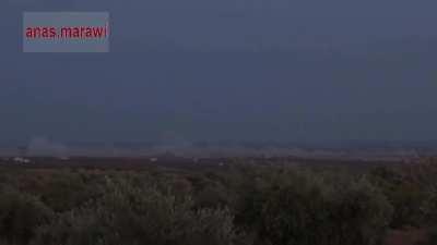 Interesting video of a Syrian MLRS launch & subsequent impacts on an Opposition controlled village - Sakik, Idlib - 2015