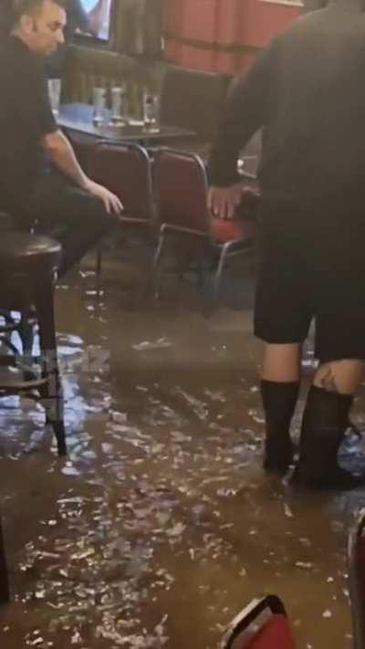 Nothing stops a Brit getting a pint! Floods in Birmingham yesterday.