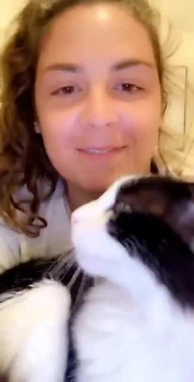 A cat adopted my sister. When you kiss her, she kisses back!