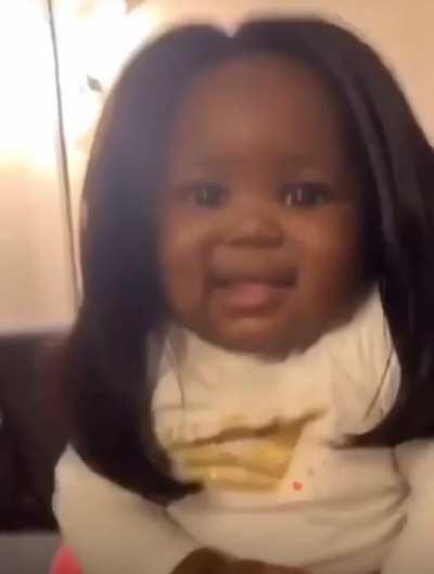 Baby in a wig, mom can’t breath. 