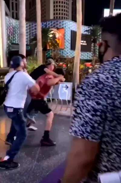 Racist at Las Vegas strip calls a group of guys “Dirty Mexicans” then shows his KKK tattoo. Him and his buddy proceed to get beat up