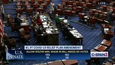 Senator Sinema walks on to the floor, pats Mitch McConnell on the back, then votes against a $15 minimum wage with a thumbs down.