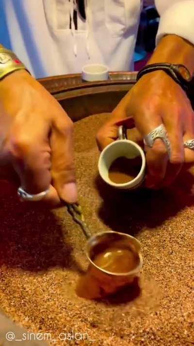 Vendor makes Turkish coffee