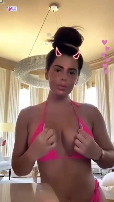 Brielle just can't resist flaunting her big tits any chance she gets